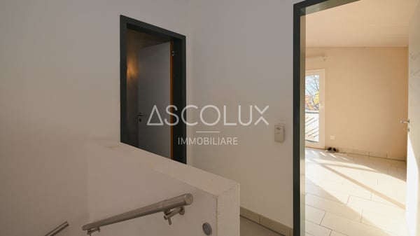 Casa bifamiliare con appartamenti di 3.5 & 4.5 locali indipendenti e grandi locali accessori-/hobby | Zweifamilienhaus mit unabhängigen 3.5 & 4.5 Zimmer Wohnungen und Großen Neben-/Hobbyräumen 13