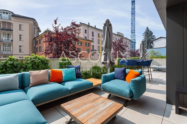 Esclusivo appartamento con giardino di 1.5 locali con climatizzazione completa | Exklusive 1.5-Zimmer-Gartenwohnung mit vollständiger Klimatisierung 1