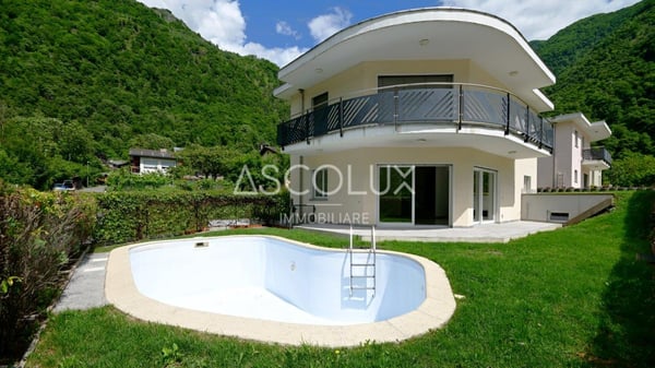 Hübsches 4.5-Zimmer-Einfamilienhaus mit Garten und Pool in ruhiger Wohnlage 2