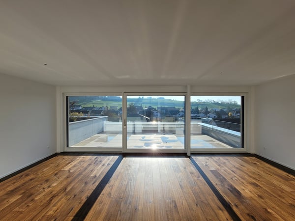 Attraktive 3.5-Zimmer-Attikawohnung mit hochwertigem Ausbau und traumhaftem Süd-West Ausblick 3