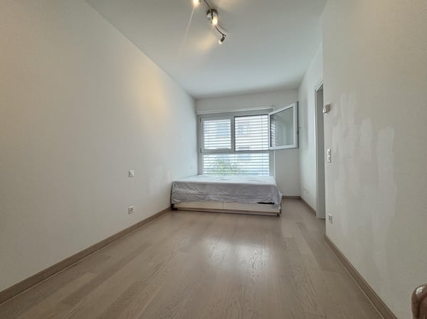 LUMINOSO 1.5 CON BALCONE E 2 POSTI AUTO IN CENTRO A LUGANO 6