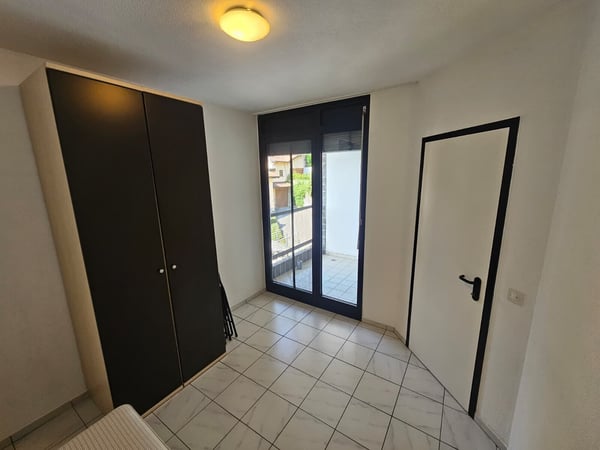 AFFITTASI AMPIO 1.5 LOCALI ARREDATO CON BALCONE A CANOBBIO 4