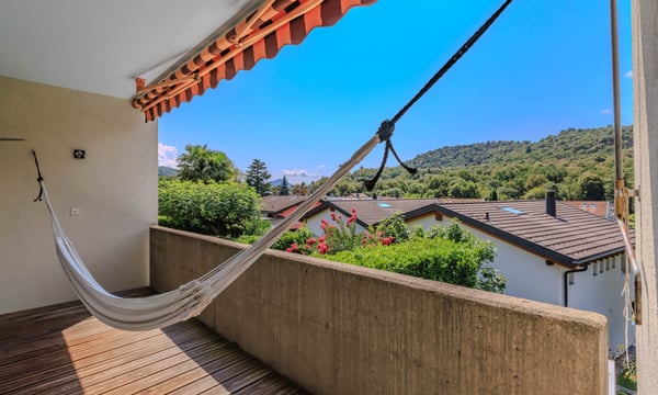 CASA A SCHIERA DI 1.5 LOCALI CON GIARDINO A PONTE CAPRIASCA 7