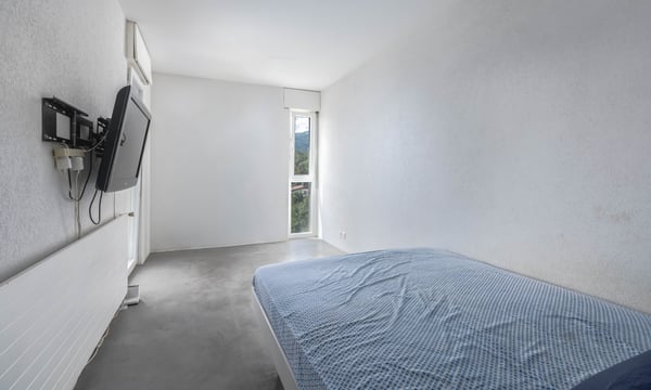 CASA A SCHIERA DI 1.5 LOCALI CON GIARDINO A PONTE CAPRIASCA 5