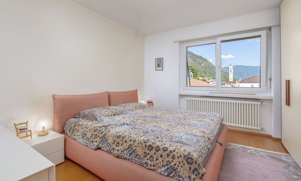 BELLISSIMO E AMPIO 4.5 CON VISTA APERTA A MORBIO INFERIORE 4