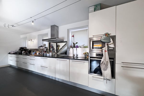 AMPIO DUPLEX 3.5 LOCALI CON GIARDINO PRIVATO AD AGNO 2