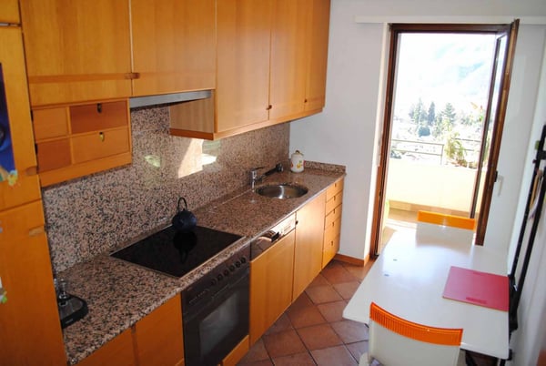 ATTICO DUPLEX MANSARDATO 5.5 LOCALI CON PISCINA A COMANO 3