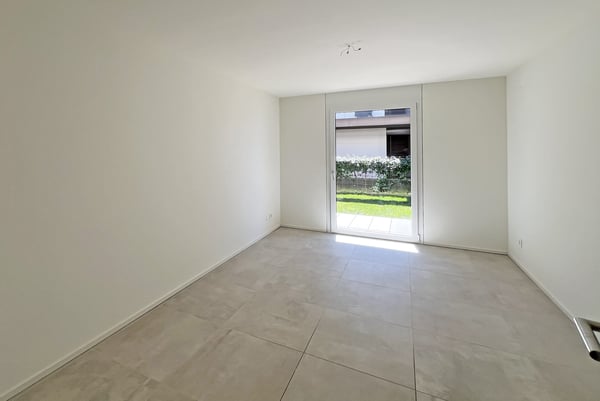 AMPIO E MODERNO 3.5 LOCALI CON GIARDINO PRIVATO A ROVIO 8
