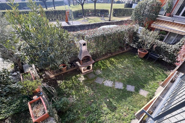 AMPIO DUPLEX 3.5 LOCALI CON GIARDINO PRIVATO AD AGNO 10