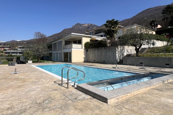 MODERNO E SPAZIOSO 3.5 CON TERRAZZA NEL VERDE A CADRO 1