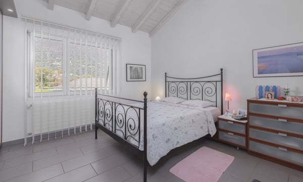 STUPENDA VILLA 8.5 LOCALI CON GIARDINO E GROTTO A GIUBIASCO 7