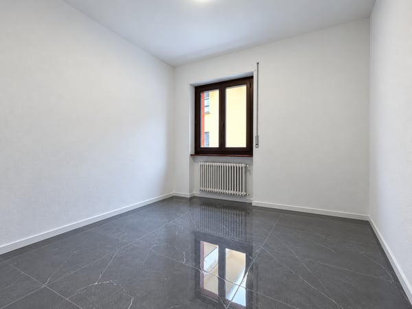 AFFITTASI ATTICO ARREDATO DI 2.5 LOCALI CON BALCONE A LUGANO 12