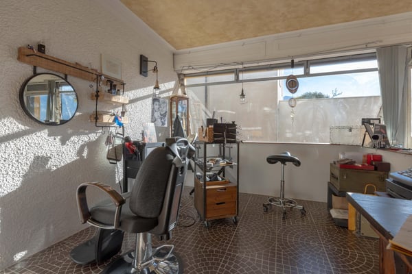 ELEGANTE BILOCALE COMMERCIALE SUL LUNGOLAGO A MELIDE 8