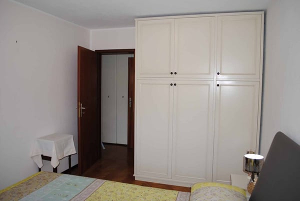 ATTICO DUPLEX MANSARDATO 5.5 LOCALI CON PISCINA A COMANO 9