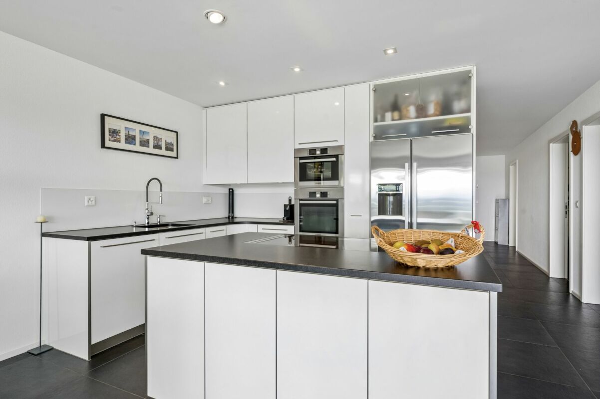 Moderne Etagenwohnung mit wunderschöner See- und Alpensicht
