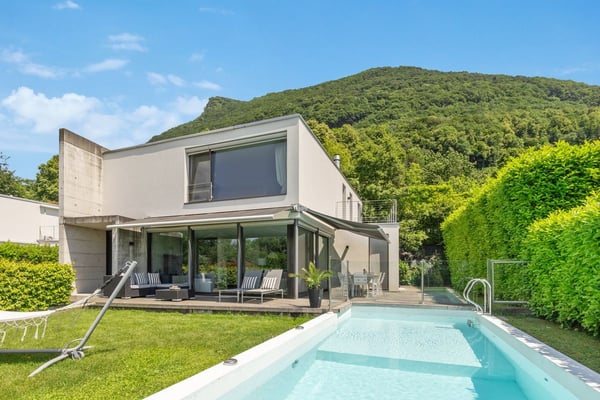 Design & Confort con piscina a Cureggia 1