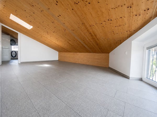 Manno-Elegante attico mansardato di 2.5 loc. completamente ristrutturato 11