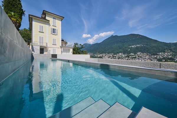 Moderno Appartamento con Terrazza, Giardino e Vista Montagna 9