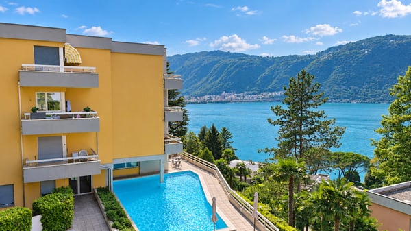 Luminoso attico con incantevole vista sul lago di Lugano