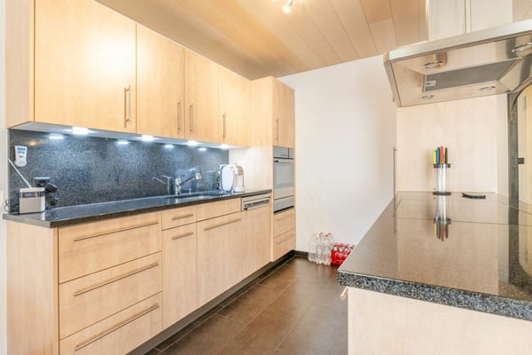 Komfortable 3.5 Zimmer Wohnung mit Balkon und zwei Tiefgaragenplätze 5