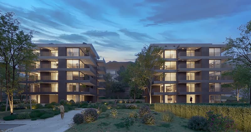 Two apartment buildings, modern architecture, many windows, balconies, green garden, trees, pathway
