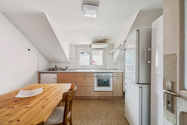 Maison villageoise de 6 appartements et 10 places de parc avec grange 5