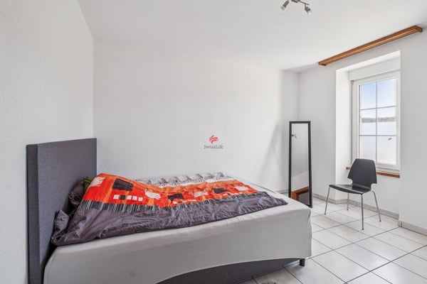 Immeuble de trois appartements loués 12