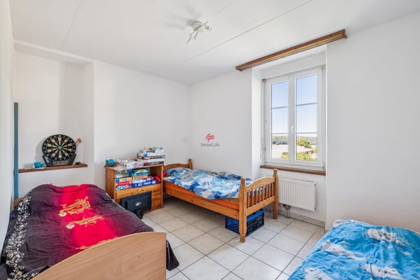 Immeuble de trois appartements loués 9