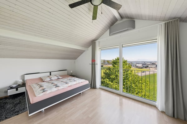 Panorama Doppeleinfamilienhaus mit See- und Bergsicht 9
