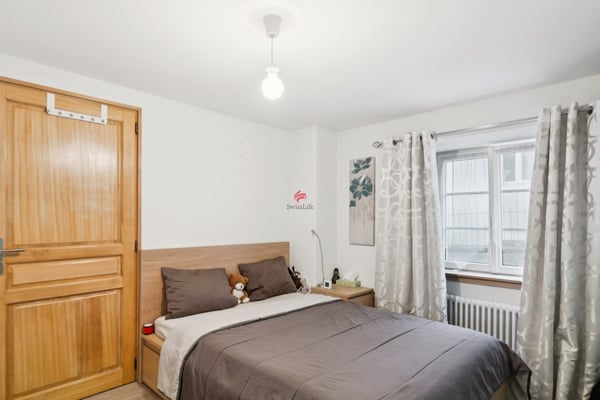 Immeuble de rendement de 5 appartements, bureaux et places de parc 6