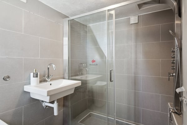 Immeuble de rendement de 5 appartements, bureaux et places de parc 8