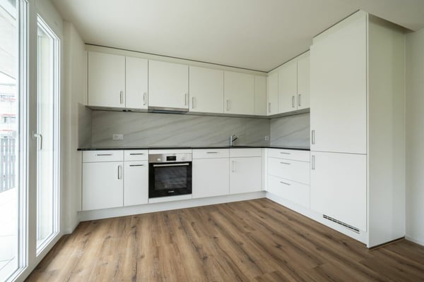 Exklusive 3.5-Zimmer-Gartenwohnung mit gedecktem Sitzplatz und privater Grünfläche 2