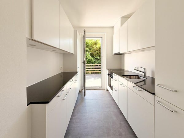 3.5 Zimmer Wohnung im 1. Stock mit Terrasse und Balkon 1