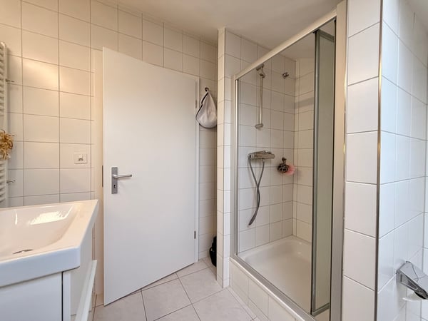 Attraktive 4.5-Zi. Maisonette mit Balkon & Garagenbox 13