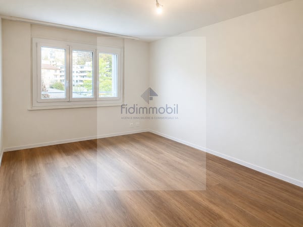 Spacieux appartement 4 pièces avec balcon et place de parc 5