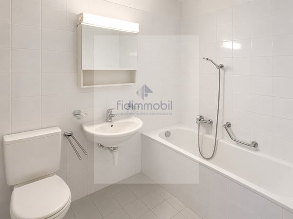 Spacieux appartement 4 pièces avec balcon et place de parc 4