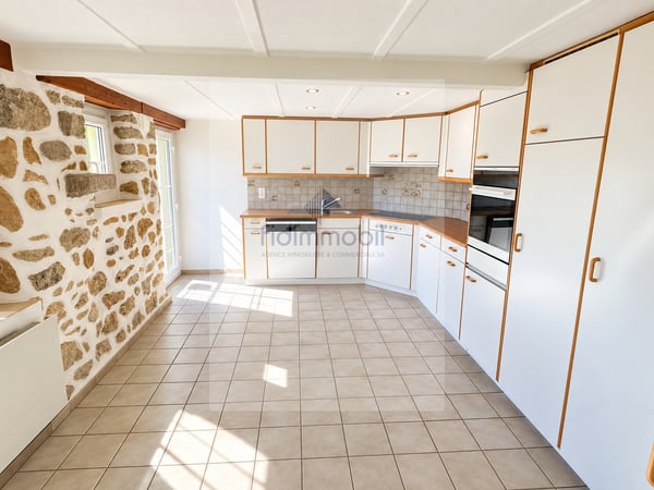 Charmant duplex de 4.5 pièces avec cheminée à Boudry 1