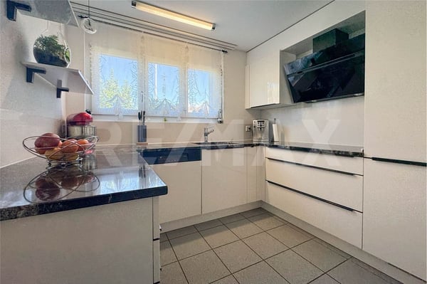 Attraktives 1.5-Zimmer-Reihen-Eckhaus in familienfreundlichem Quartier 4