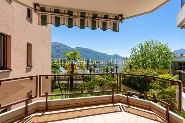 MURALTO - Appartamento con vista lago vicino alla stazione e al lungolago