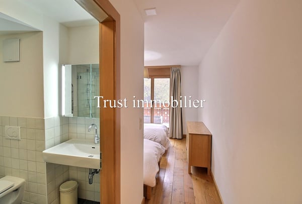 5003. Double appartement en RdC au centre de Crans 12