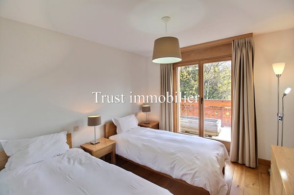 5003. Double appartement en RdC au centre de Crans 8