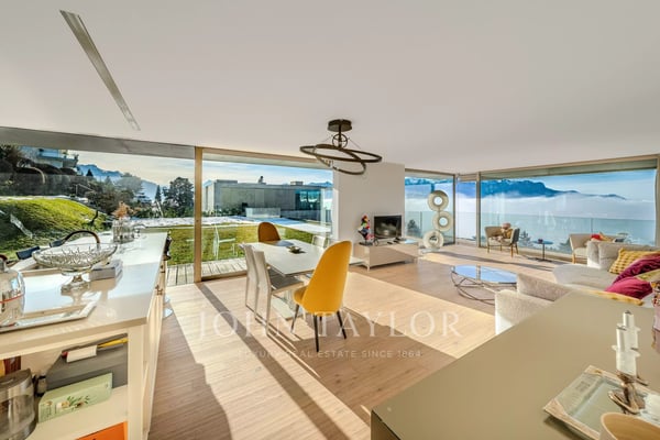 EXCLUSIVITÉ! Exceptionnel 4.5 pièces contemporain avec vue panoramique sur le lac 1
