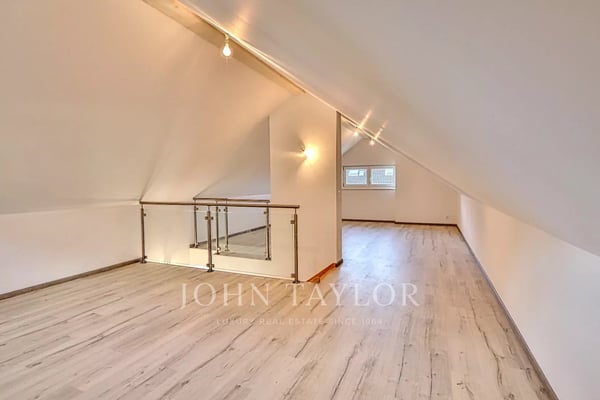 Appartement attique en duplex de 5.5 pièces 11