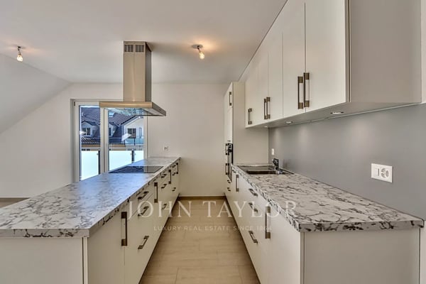 Appartement attique en duplex de 5.5 pièces 3