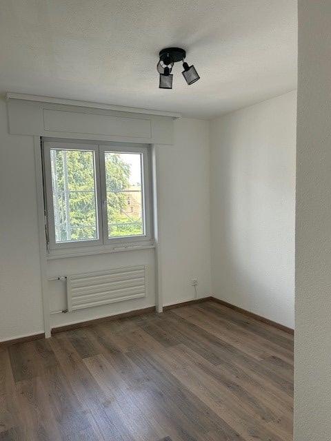 Appartement de 5.5 pièces dans un immeuble entièrement rénové au 2e étage avec balcon 5