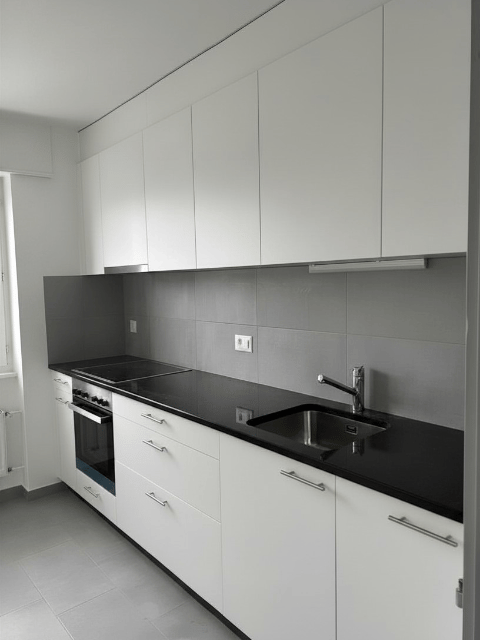 Appartement de 5.5 pièces dans un immeuble entièrement rénové au 2e étage avec balcon 3