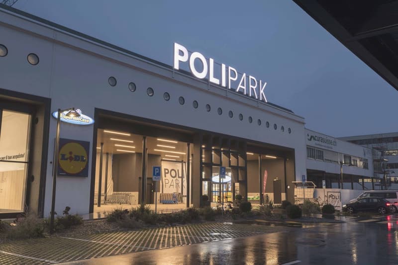 Polipark building, modern architecture, large windows, parking area, signboard, car parked