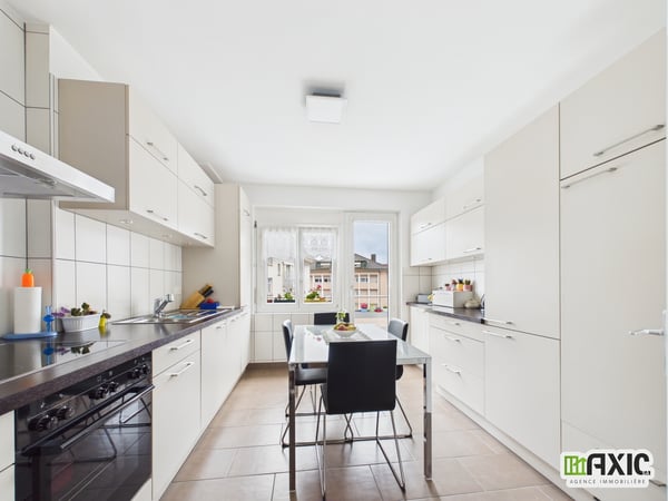À vendre à Delémont : immeuble mixte comprenant 6 logements et 1 commerce 3
