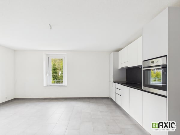 Courrendlin : 4,5 pièces rénové au 1er étage avec jardin privatif 1