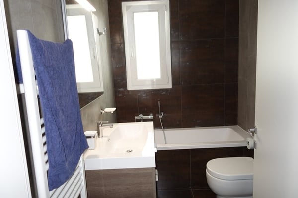 Joli appartement de 4,5 pièces en PPE idéalement situé et au calme vendu à un prix très raisonnable 12